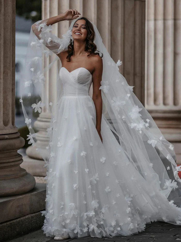 Back view of the A-line sweetheart tulle floral wedding dress.