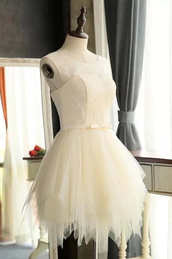Side profile of a short A-line tulle formal dress.