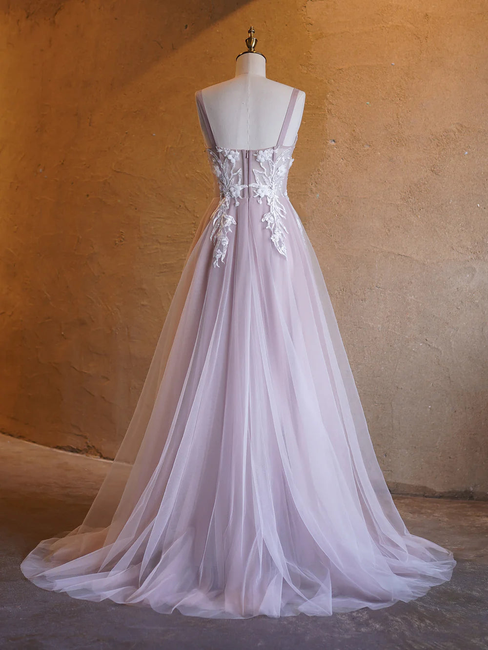 Side view of the light blue A-line prom dress, showcasing the flowing tulle skirt.