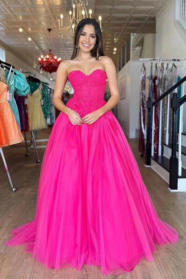Elegant A-line tiered tulle prom dress with strapless lace bodice.