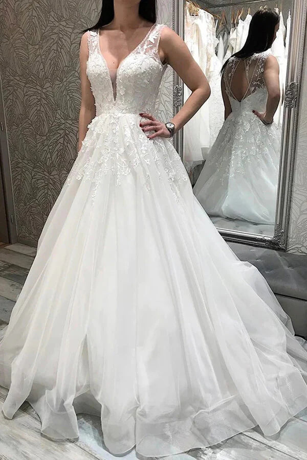 A-line tulle V-neck wedding dress with lace appliques.