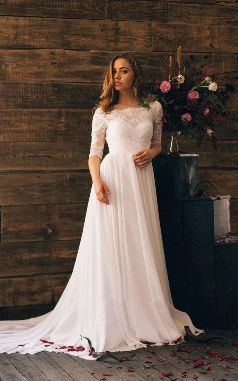 Elegant A-line V-neck wedding dress with lace bodice and chiffon skirt.