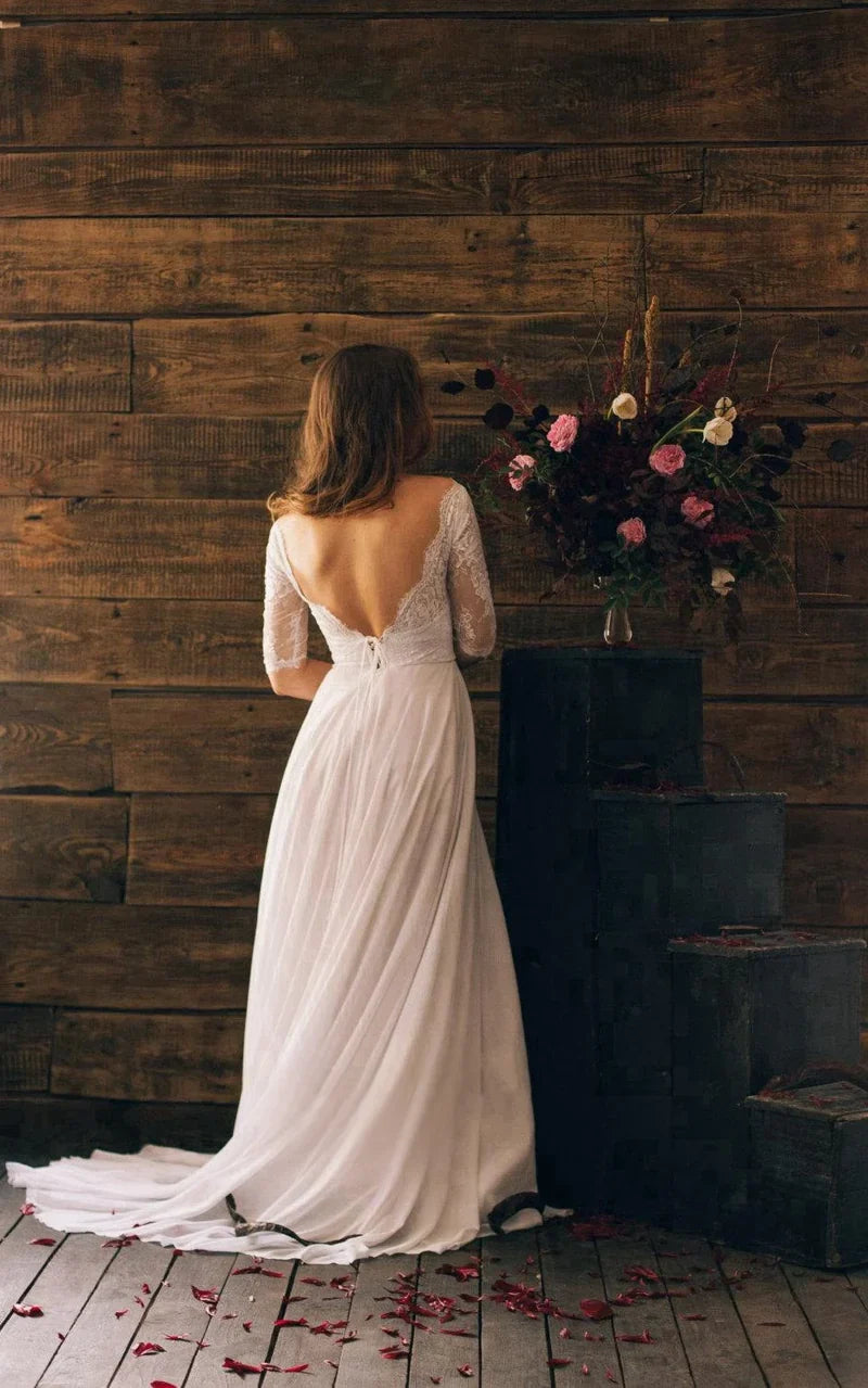Romantic A-line 3/4 sleeve long chiffon wedding dress with delicate lace bodice.