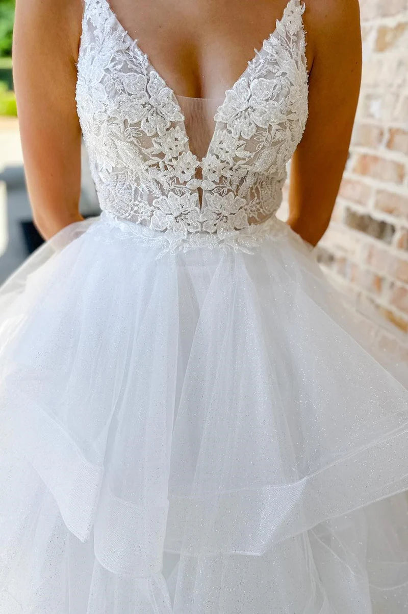 Close-up of intricate appliques on the A-line bridal gown.