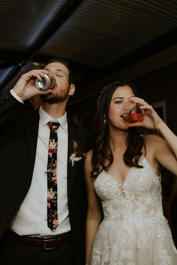 Bride wearing a beautiful A-line V-neck wedding gown with elegant appliqued straps.