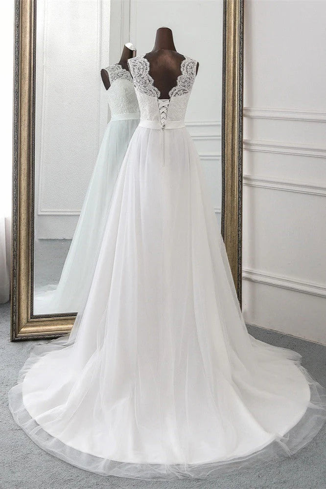 Side view of the elegant A-line bridal gown with tulle skirt.