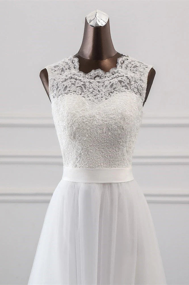Back view of the long A-line wedding dress with flowing train.
