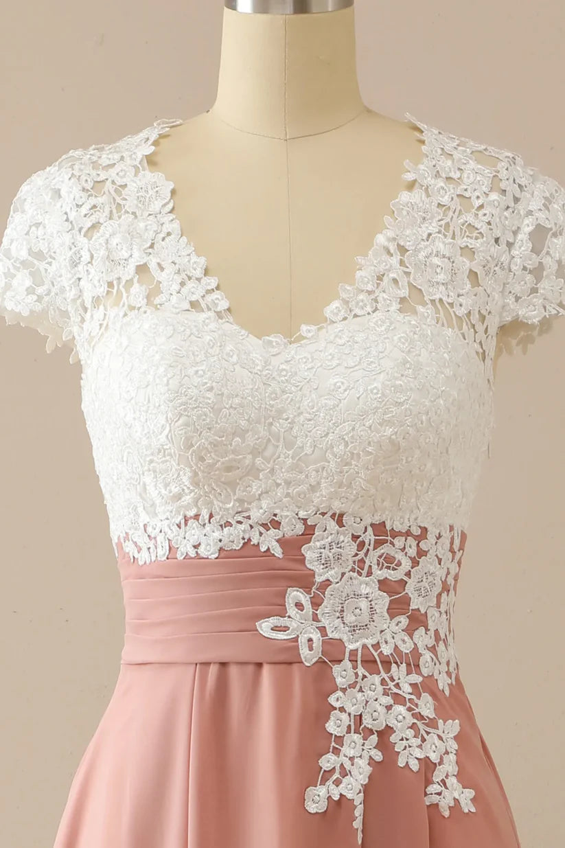 Close-up of the V-neckline and applique details on the dress.