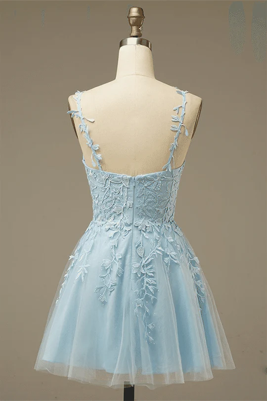 Side view of a model wearing the A-line V-neck mini homecoming dress, showcasing the tulle skirt.