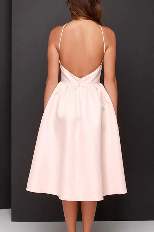 Backless design of the pink A-line tea length homecoming dress.