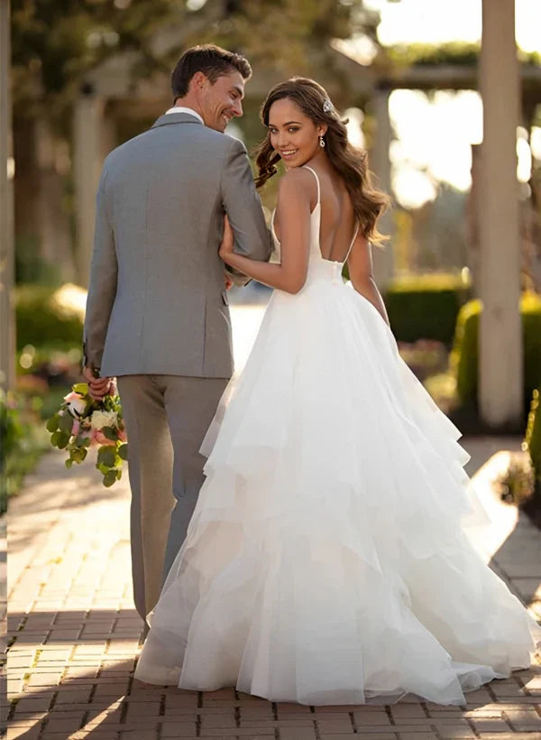 Full view of A-line ball gown wedding dress with voluminous tulle skirt.