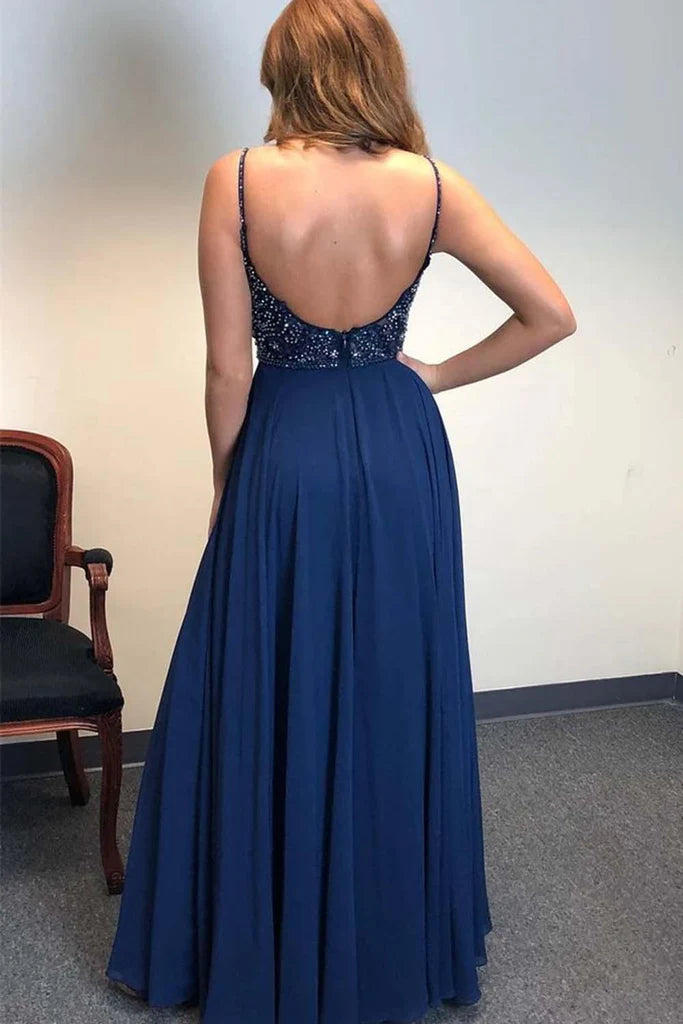 Full view of the dark navy A-line evening dress featuring spaghetti straps and delicate beadwork.