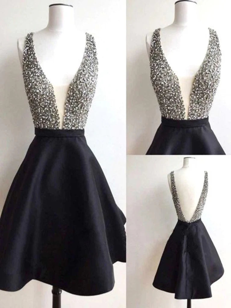 Elegant A-line V-neck dress with a beaded bodice, suitable for formal events.