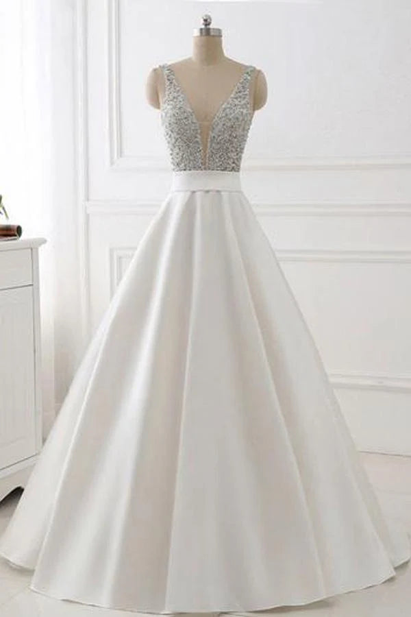 Full view of an elegant A-line V-neck beaded satin long prom dress.