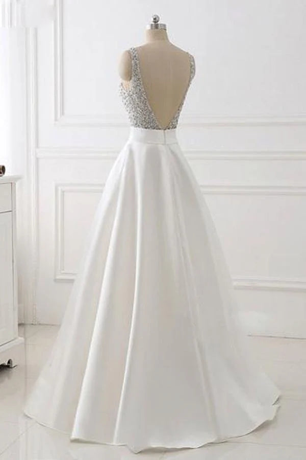 Side view of the A-line V-neck beaded satin long prom dress, showing the flowing skirt.