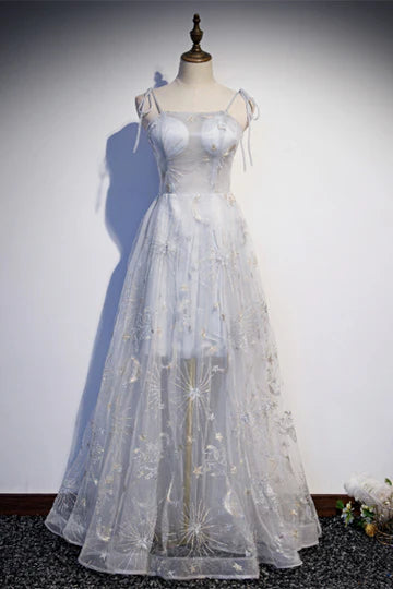 Elegant A-line formal dress with V-neck, bow tie shoulders, and intricate embroidery.