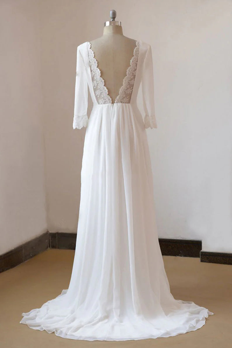 Back view of an A-line chiffon wedding dress, highlighting the backless design and long sleeves.