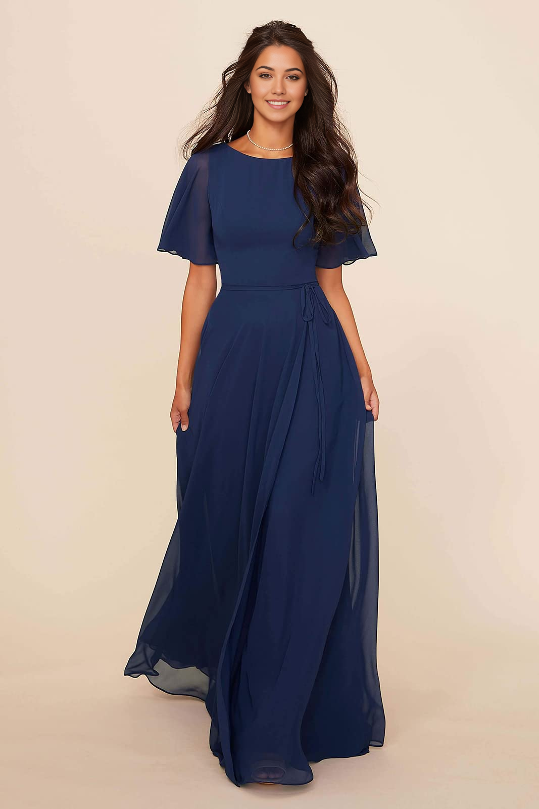 Model wearing an elegant A-line V-neck chiffon formal dress with pockets and a sash.