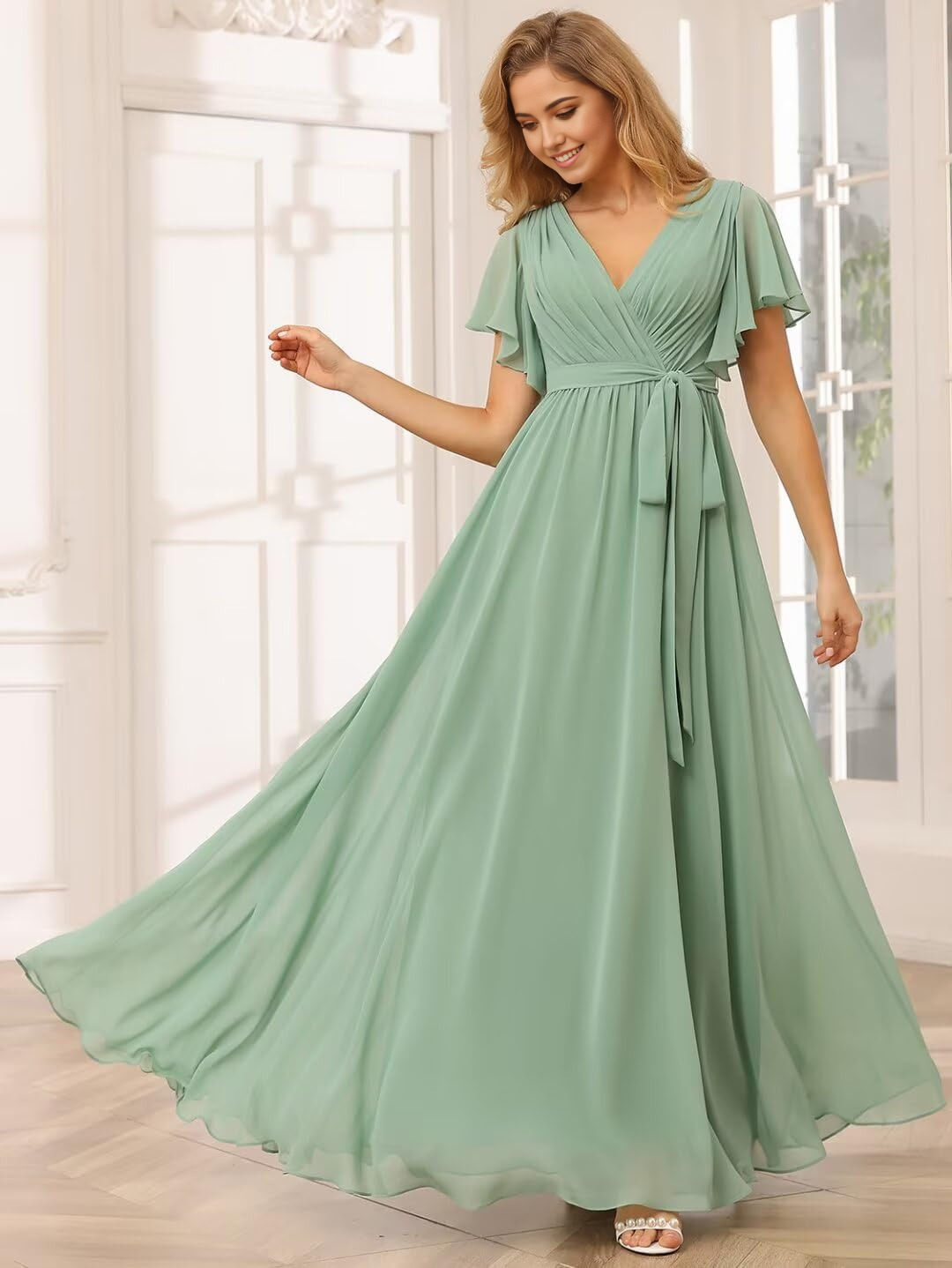 Full-length A-line V-neck chiffon flutter sleeve formal dress.