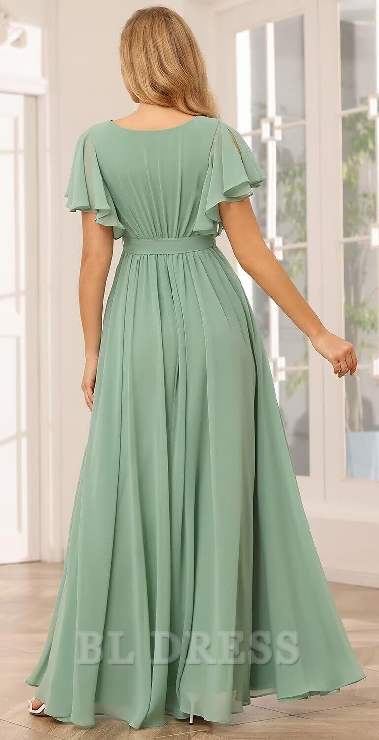 Close-up of the V-neckline and flutter sleeves on a chiffon dress.