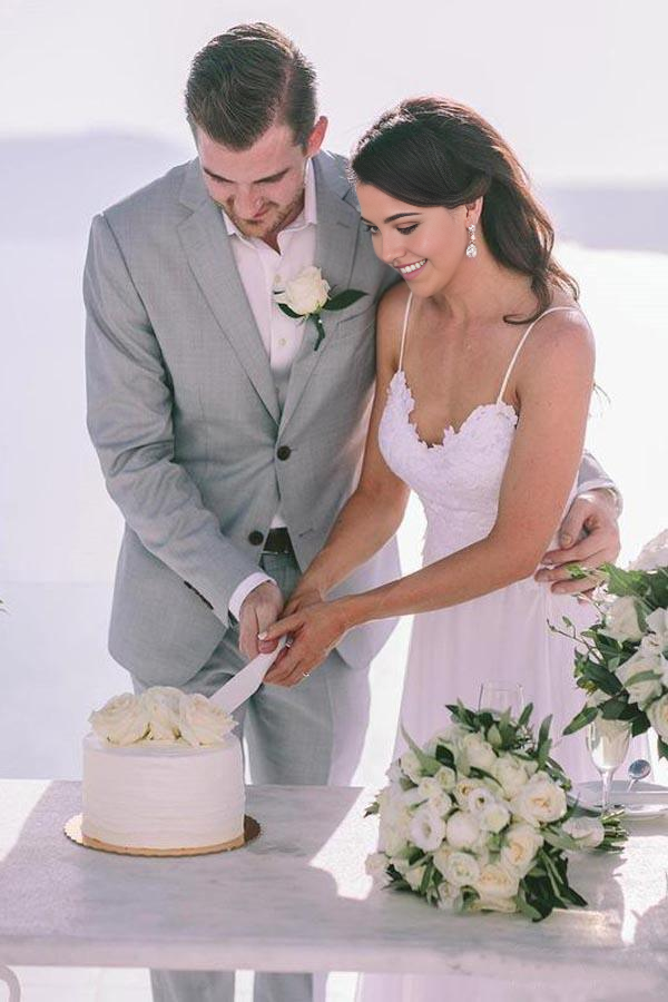 Back view of the V-neck lace wedding dress with delicate spaghetti straps.