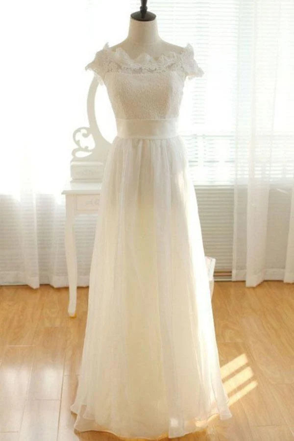 Model wearing an elegant A-line V-neck chiffon lace long wedding dress.