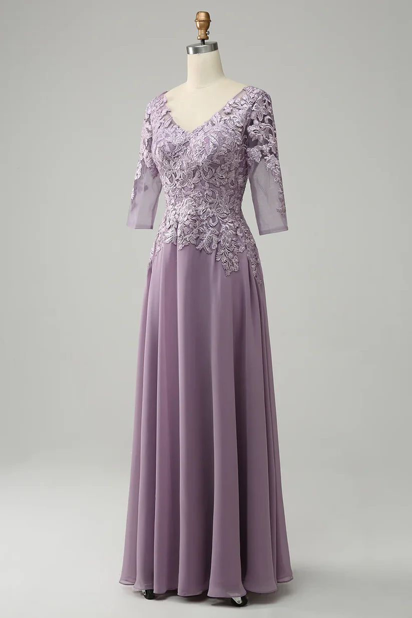 Close-up of the lace detailing on the bodice of the chiffon Mother of the Bride dress.