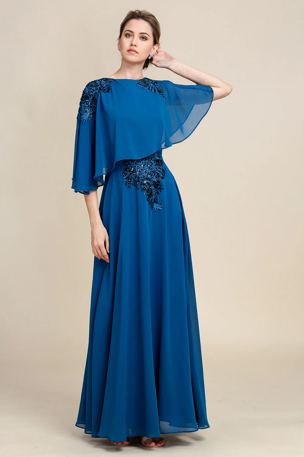 Elegant A-line chiffon mother of the bride dress with lace detail.