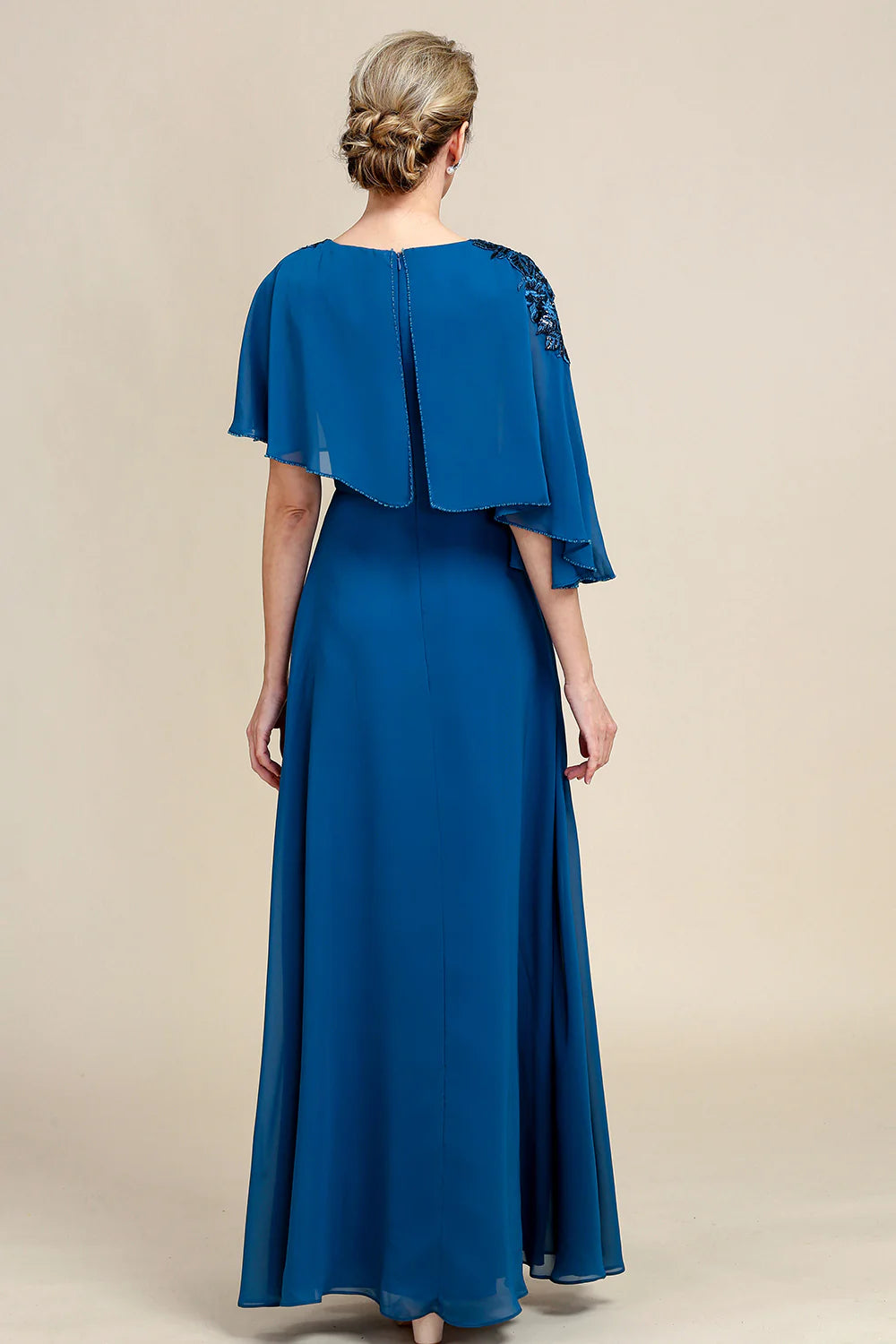 Peacock blue A-line V-neck gown with delicate lace.