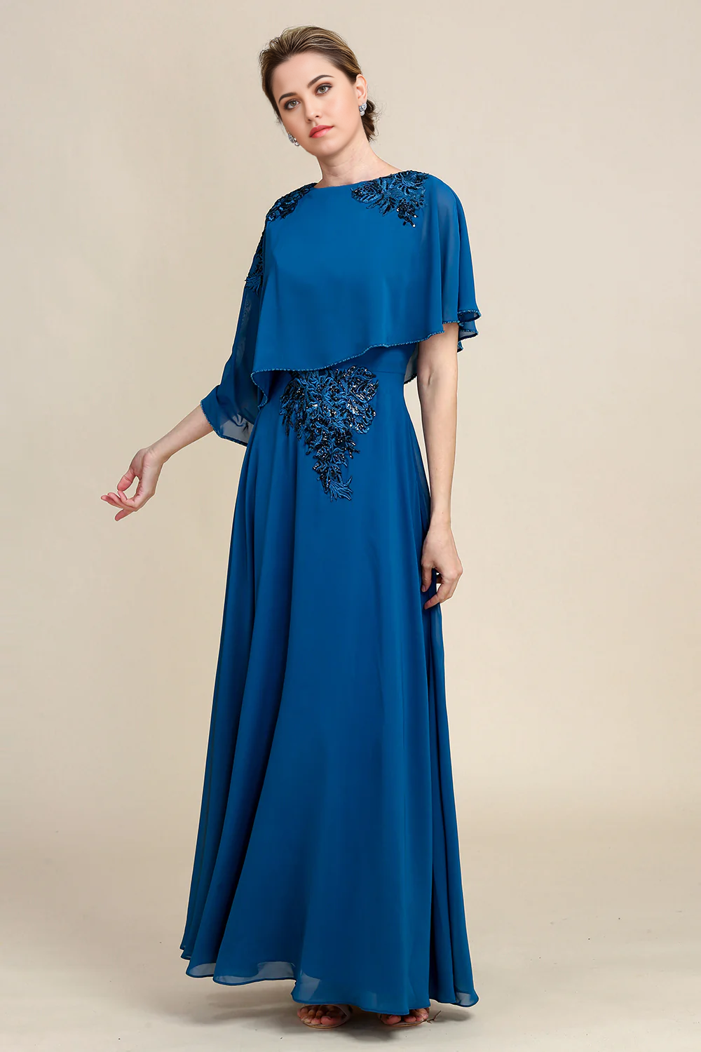 Close-up of intricate lace on the V-neck chiffon dress.