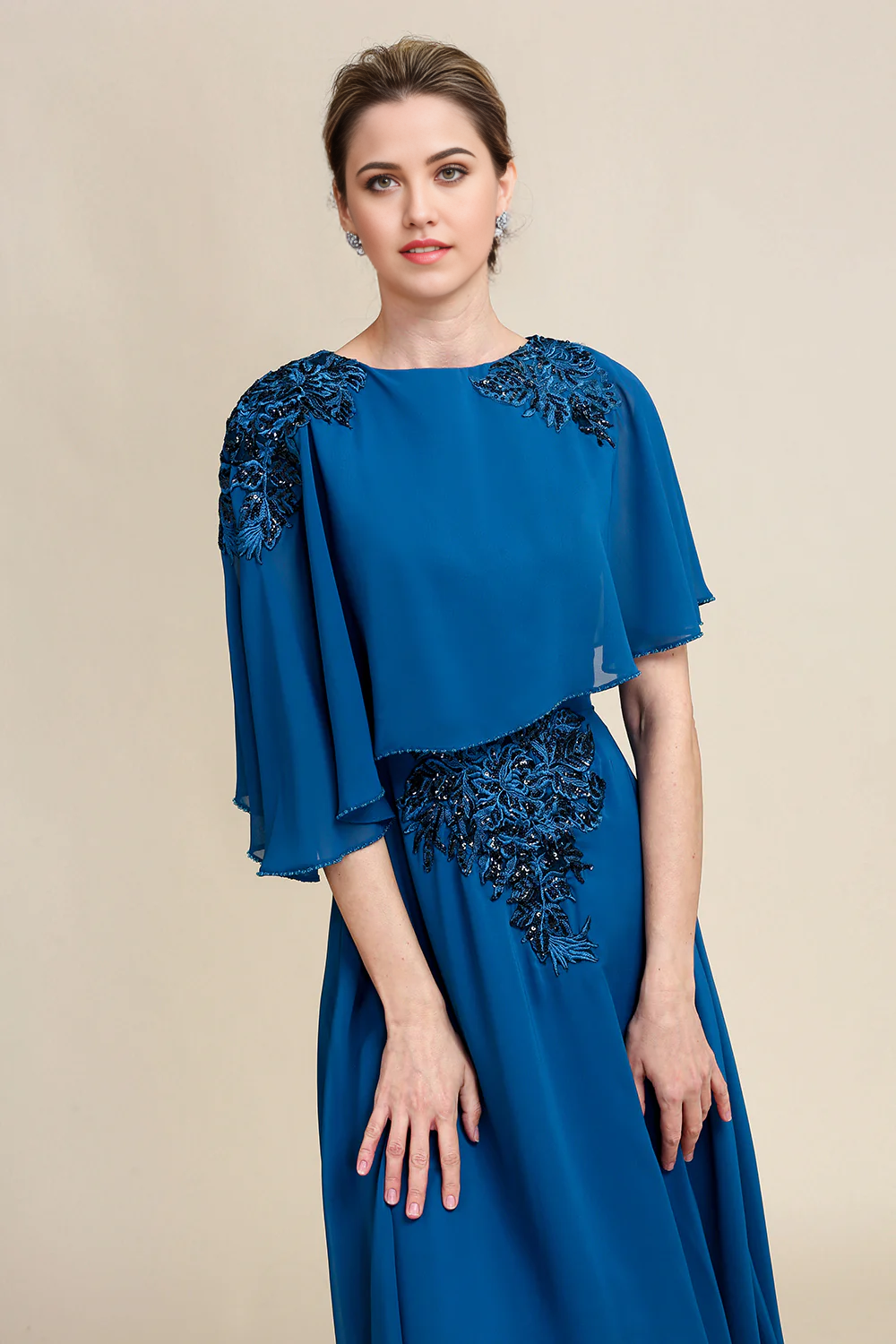 Back view of the flowing A-line mother of the bride dress.
