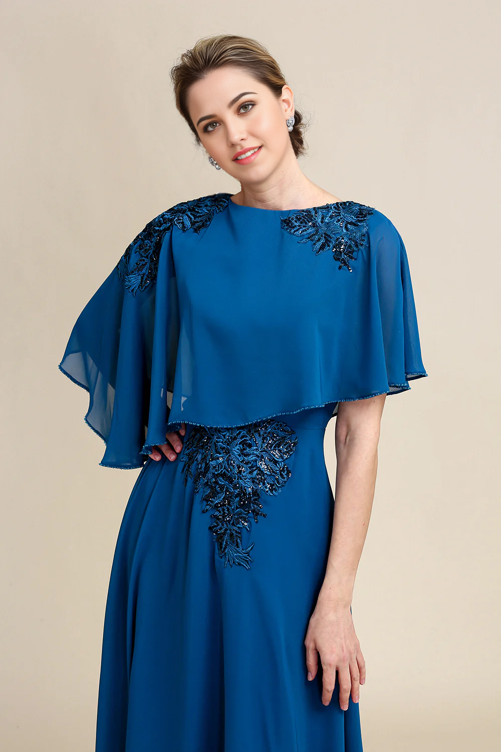 Full length view of the formal chiffon and lace dress.