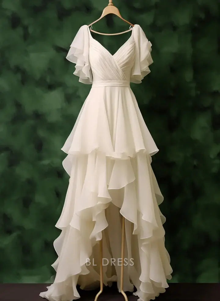 Elegant white A-line V-neck chiffon dress with layered high-low hem.