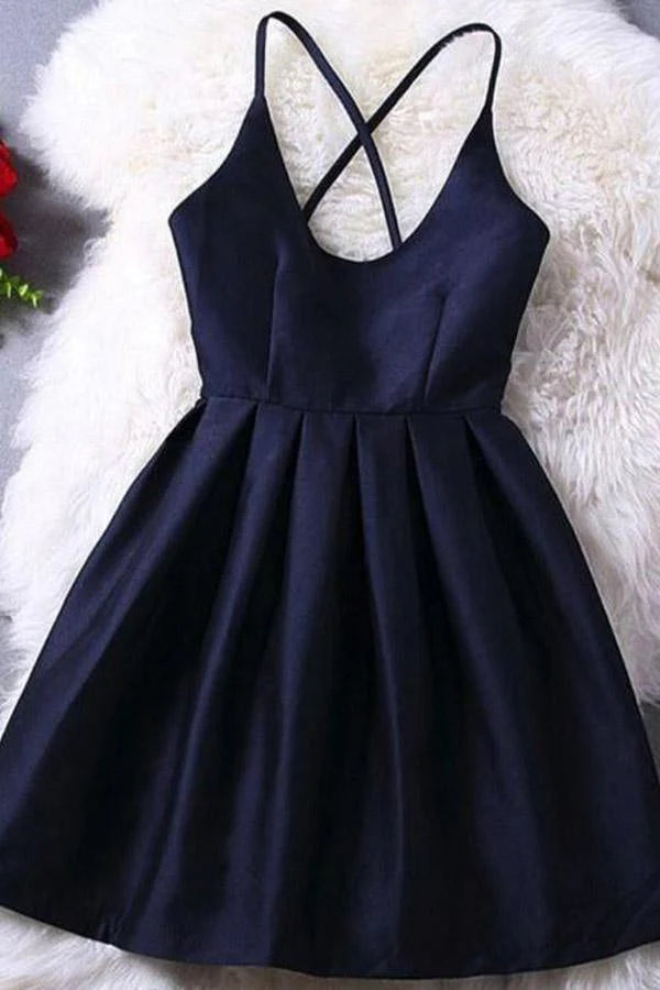 Dark navy A-line homecoming dress with V-neck and criss-cross back straps.