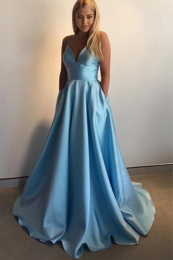 Side view of the A-line burgundy prom dress, showing pockets.
