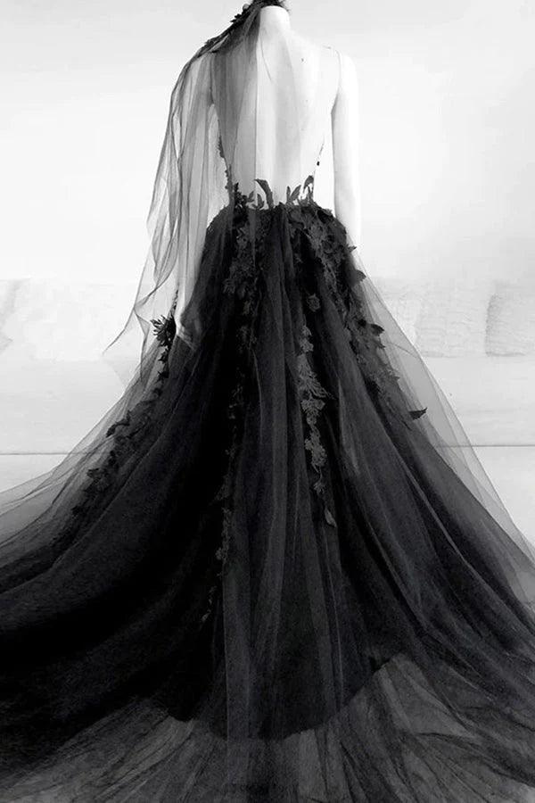 Woman wearing a long floral A-line V-neck evening gown.