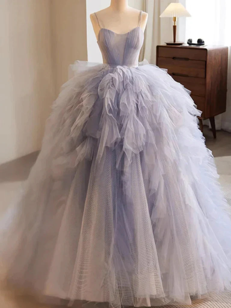Elegant A-line high-low tulle prom dress with V-neck and train.