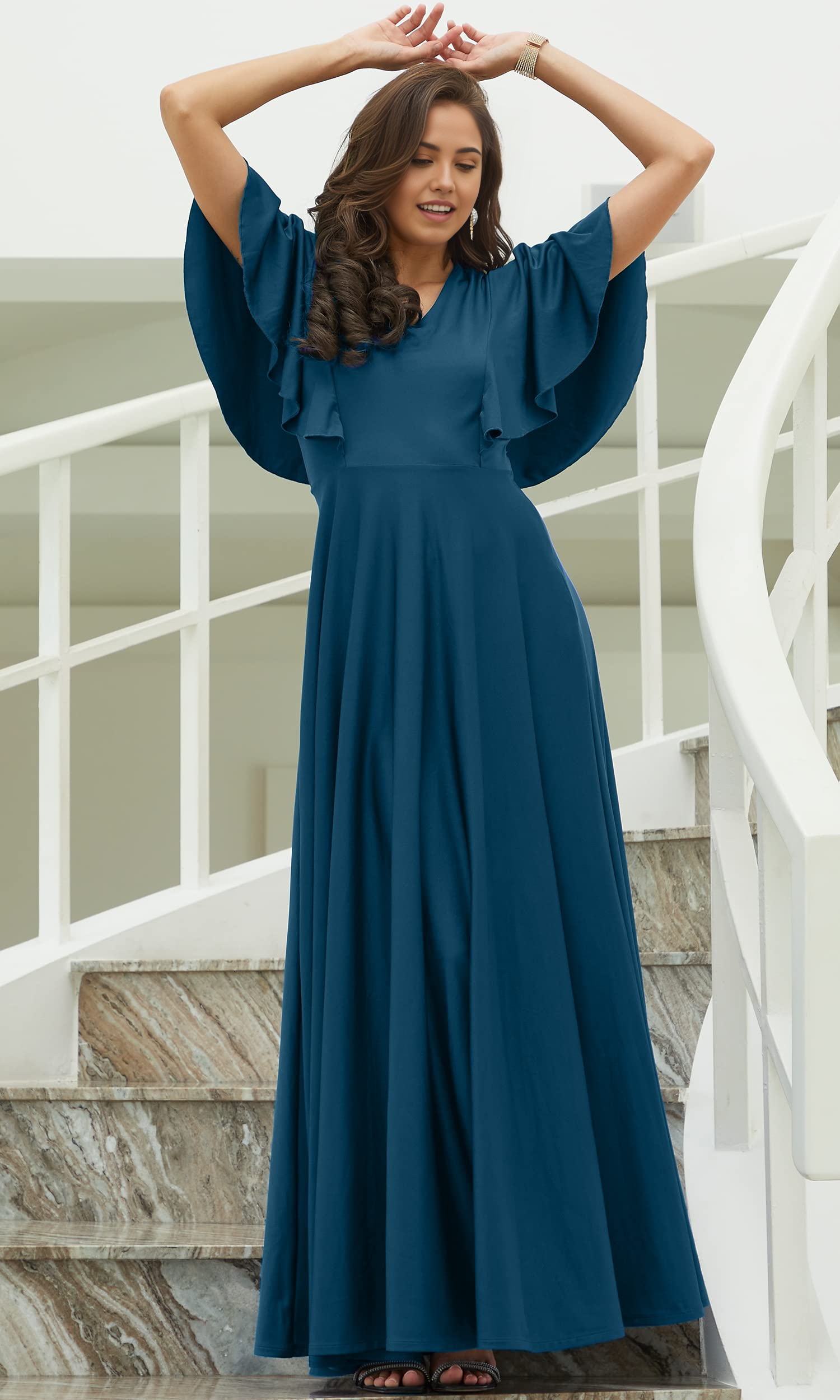 Elegant A-line V-neck maxi gown in a formal setting.