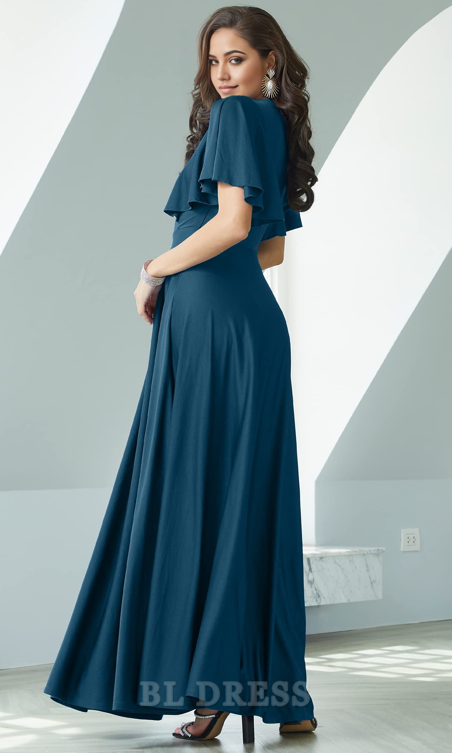 Back view of a woman wearing an A-line V-neck formal dress.
