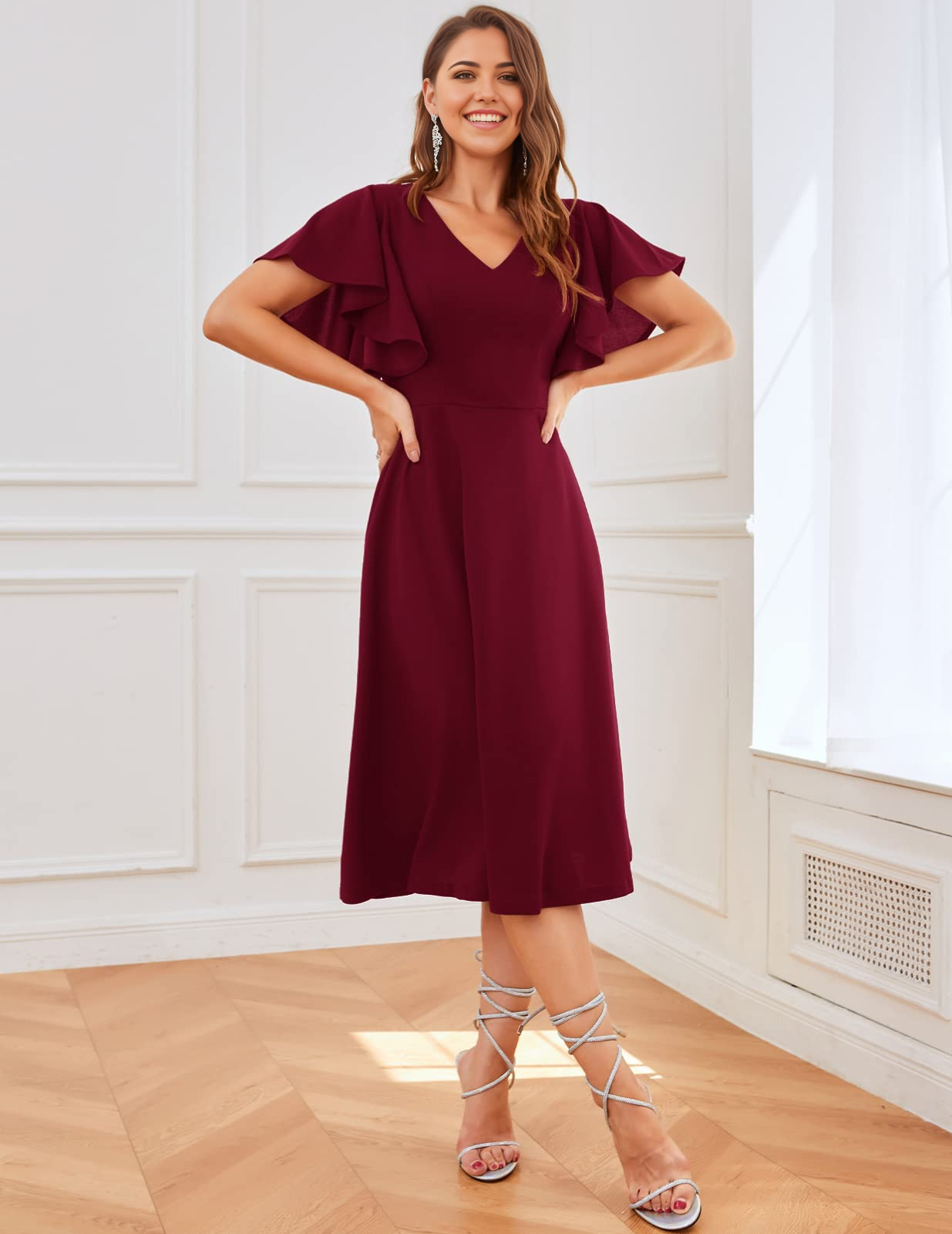 Elegant A-line V-neck tea length formal dress.
