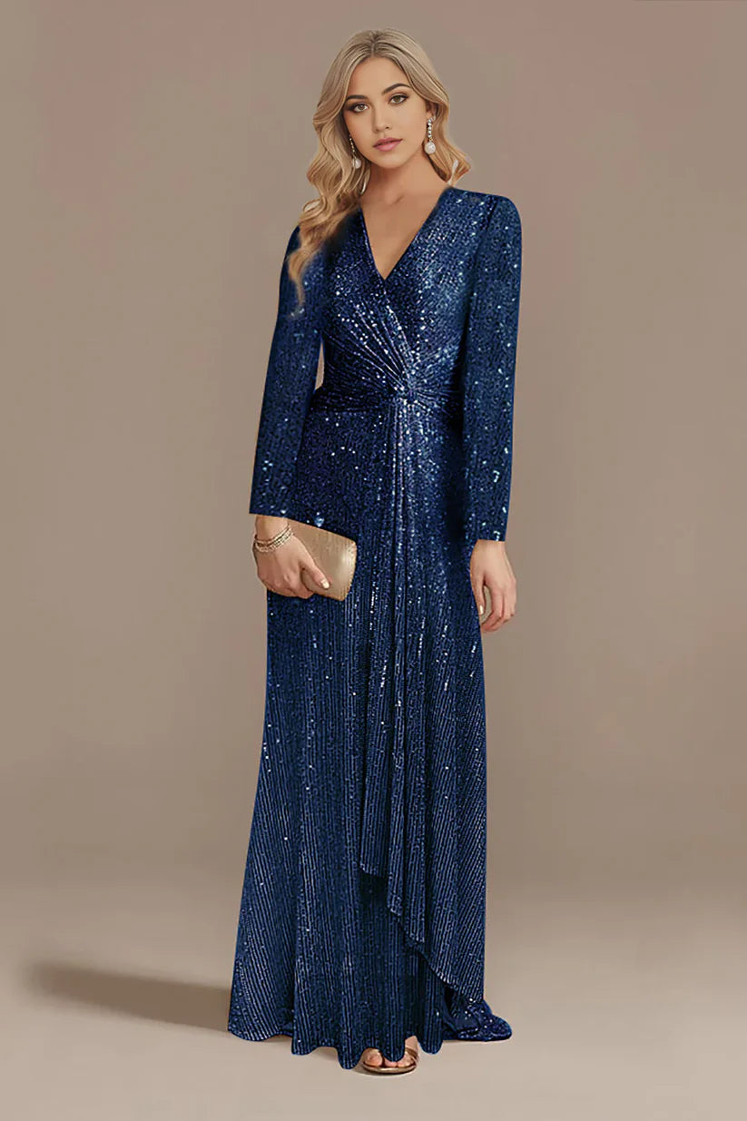 Woman wearing an A-line glitter Mother of the Bride dress with long sleeves and V-neck.