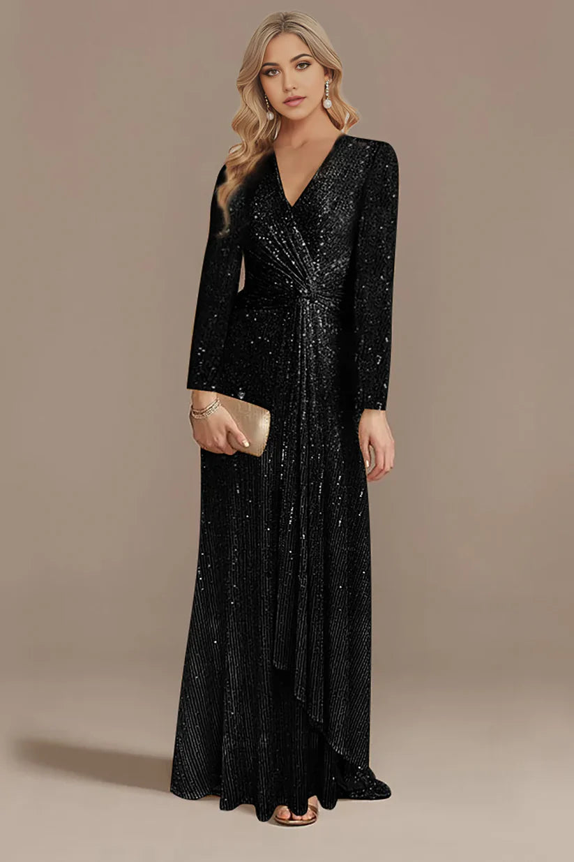 Close-up of the glitter fabric and long sleeves on the A-line dress.