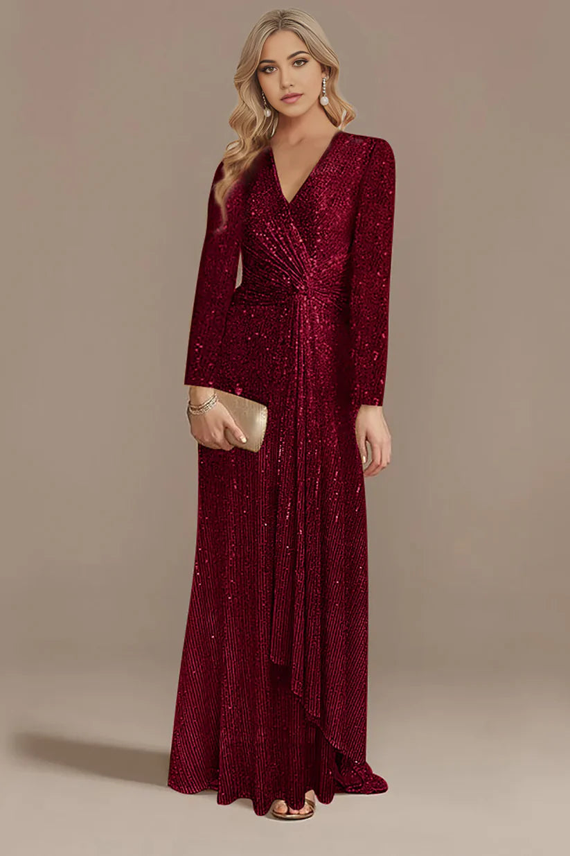 Woman walking in the flowing A-line glitter gown.
