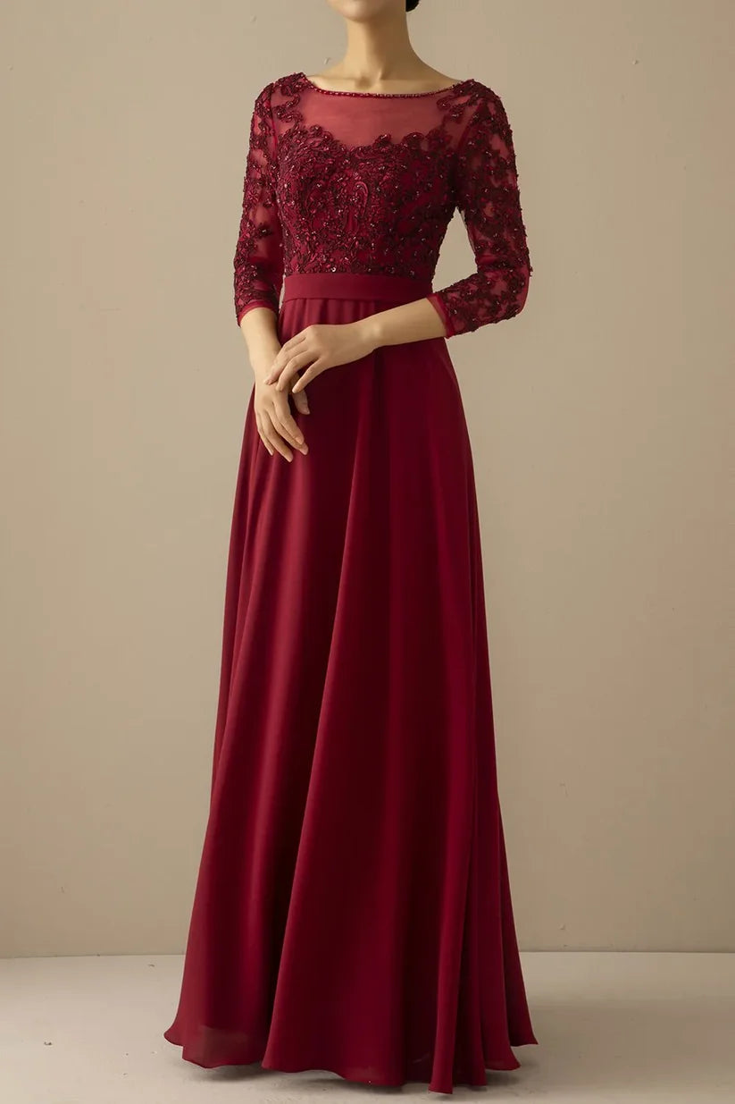 Elegant A-line Mother of the Bride dress with V-neck and illusion sleeves.