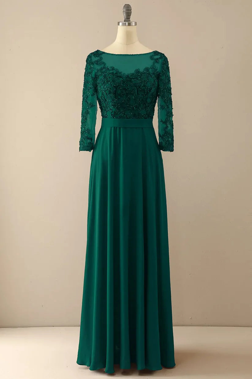 Elegant formal dress with illusion sleeves.