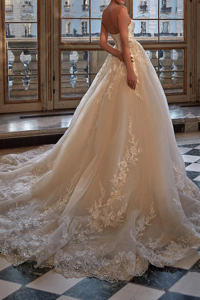 Side view of A-line V-neck lace appliques ball gown wedding dress.