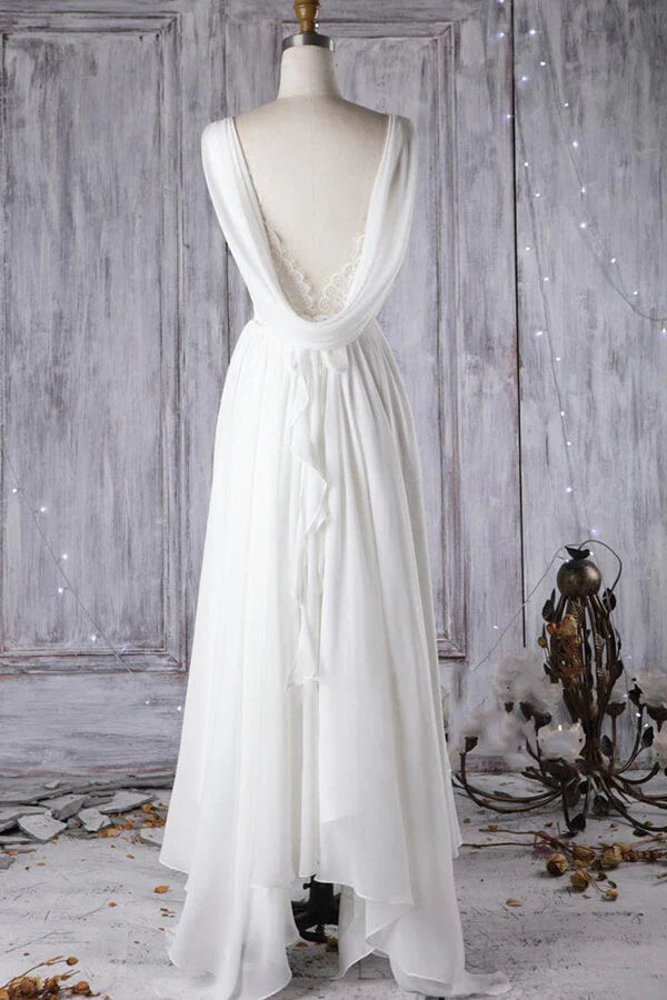 Back view of the A-line wedding dress showcasing the asymmetric open back design.