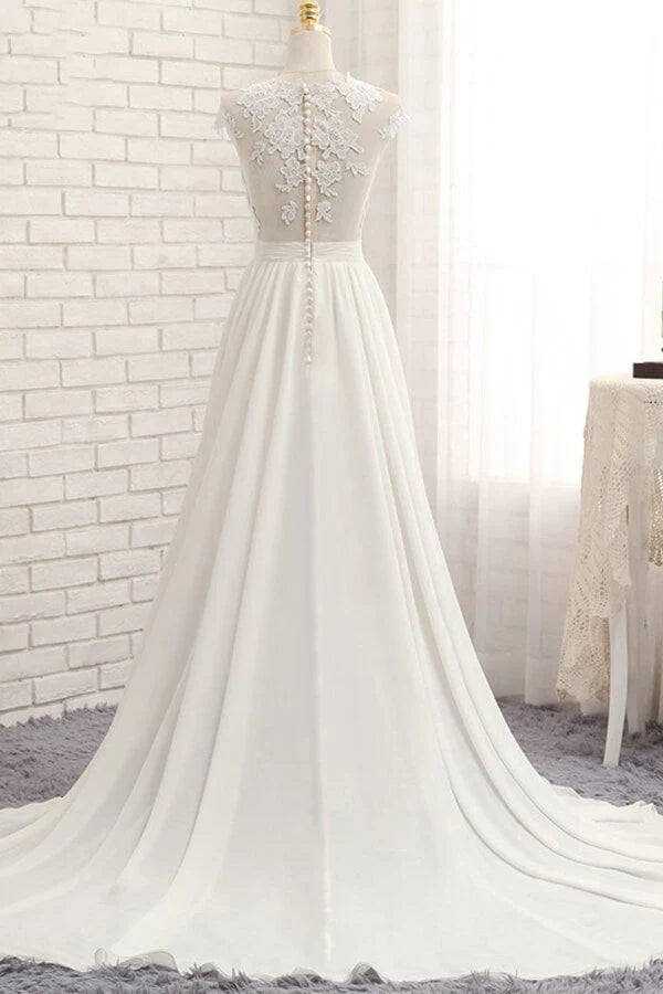Side view of the flowing chiffon A-line wedding dress with a high slit.
