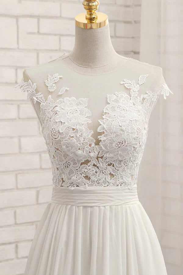 Back view of the A-line chiffon wedding dress with lace details.