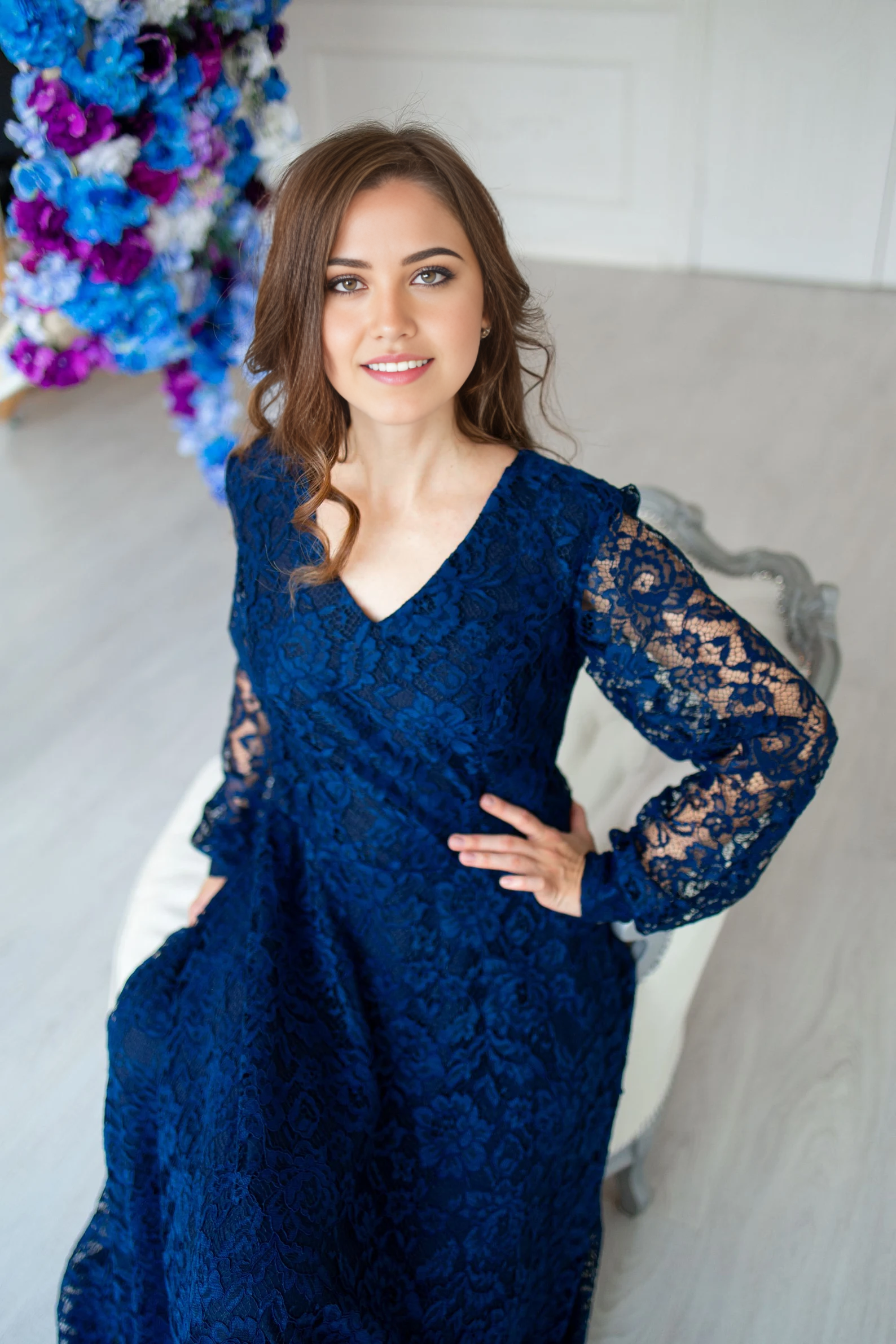 Back view of the elegant A-line V-neck lace dress.